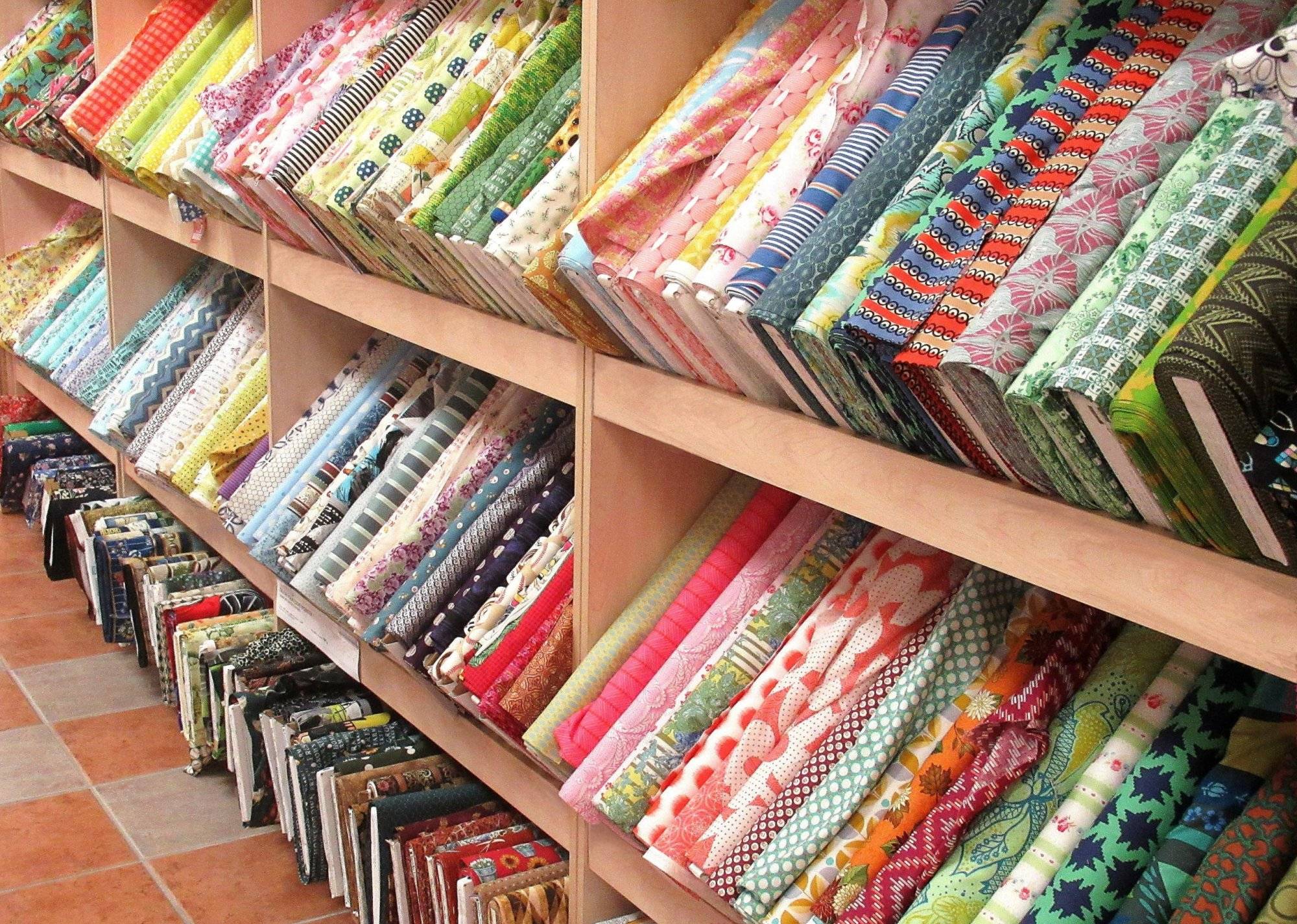 Lifestyle, ” Bolts of Colorfully Patterned, Cloth Fabric “ Lifestyle,