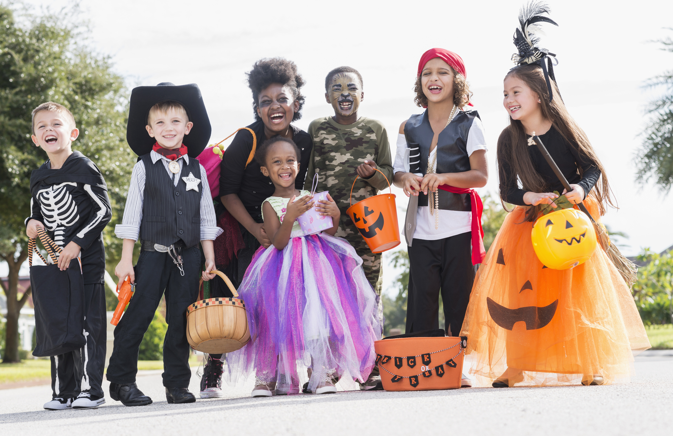 Multi-ethnic group of children in halloween costumes