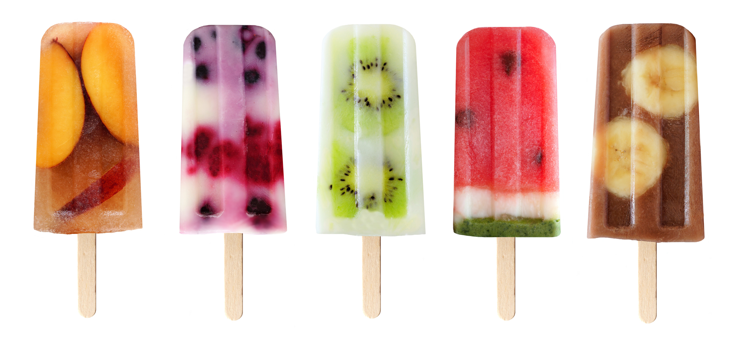 Variety of fruit popsicles isolated on white