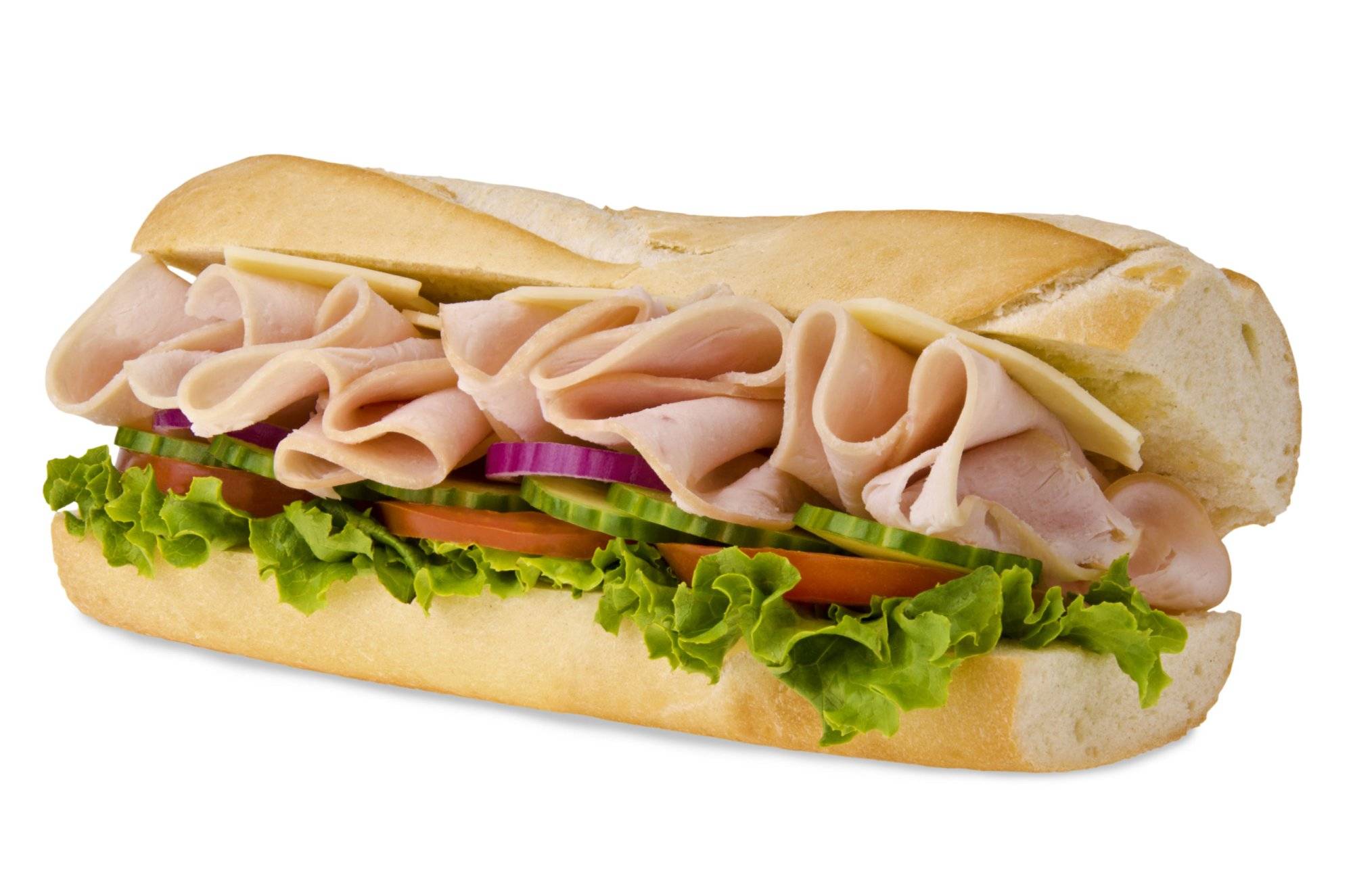 A sub sandwich overflowing with ham A sub sandwich overflowing with ham